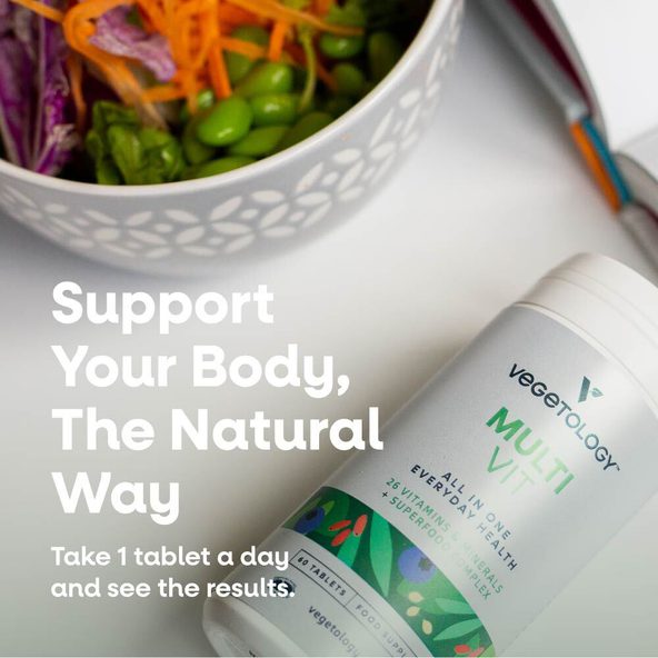 MultiVit bottle beside a bowl of salad with edamame and shredded carrot, with dosage guidance of one tablet a day